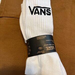 Vans Classic White Crew Long Socks 3 Pack. Vans logo on each socks.
